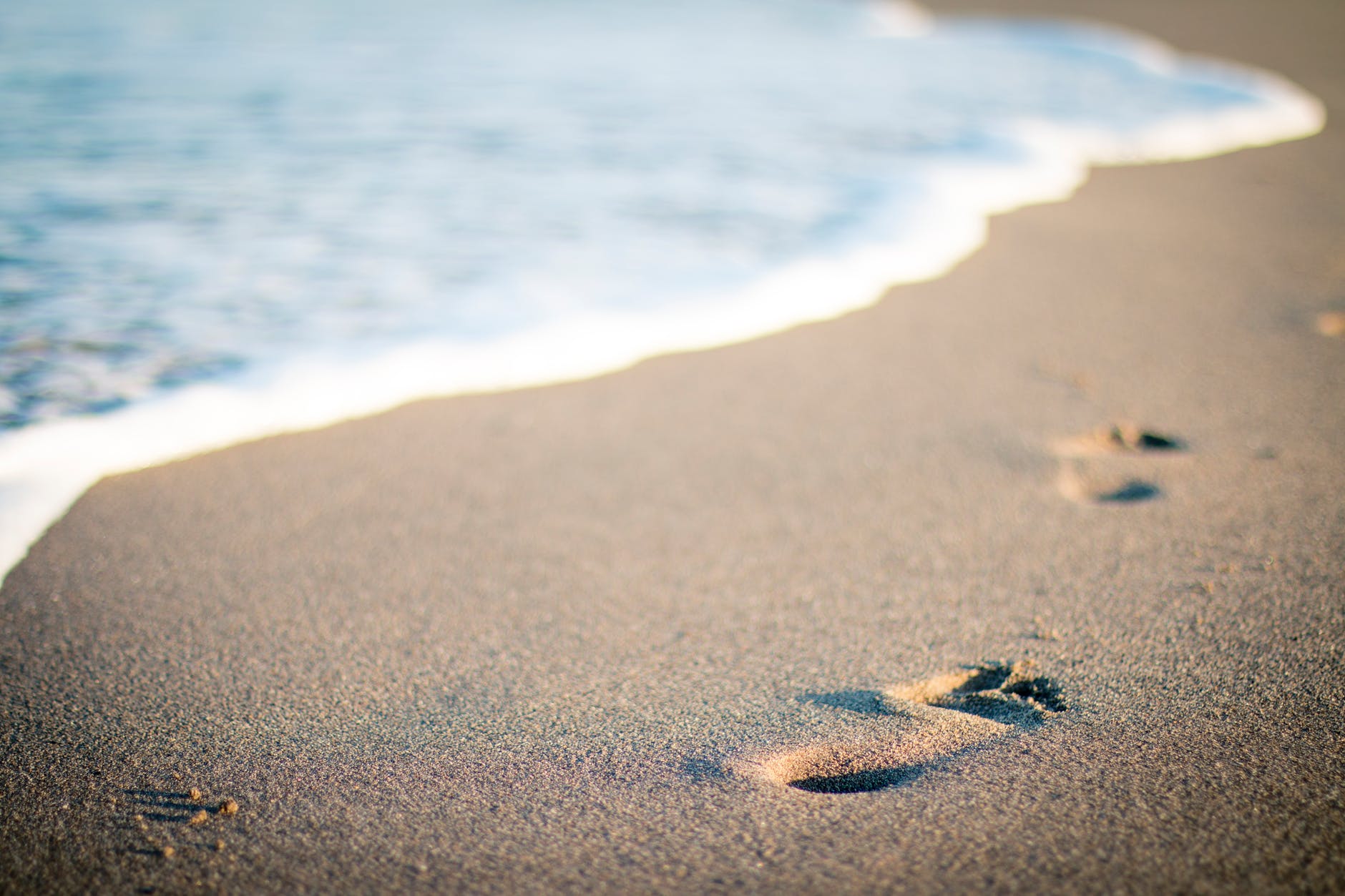 beach water steps sand